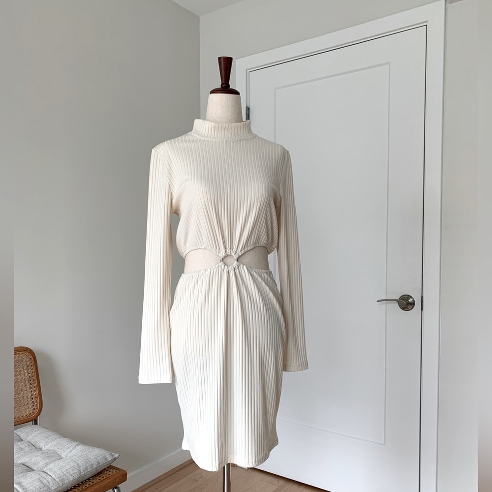 Dream Bandits Dress with Cut-outs. Size Medium.
